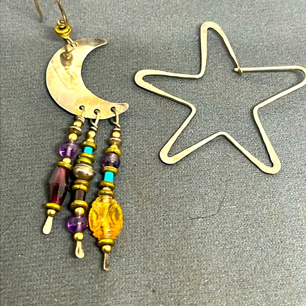 Silver moon and star earrings.